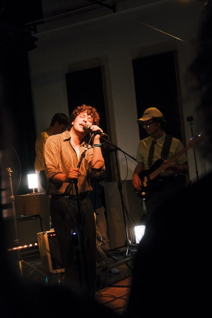 Person on stage singing 