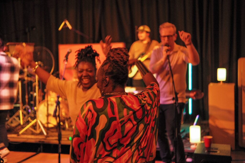 Two people having a good time dancing at YesWay